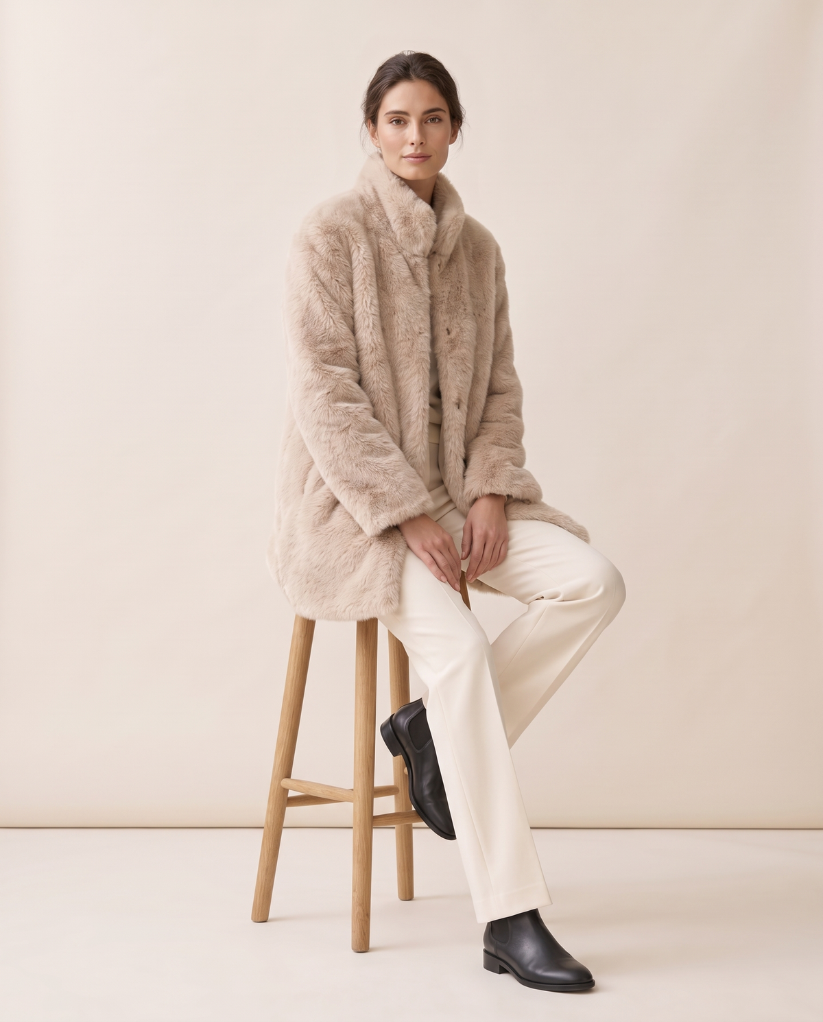 Faux Fur Coat with Quilted Lining — worn seated