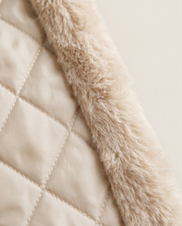 Faux Fur Coat with Quilted Lining — quilted lining close-up