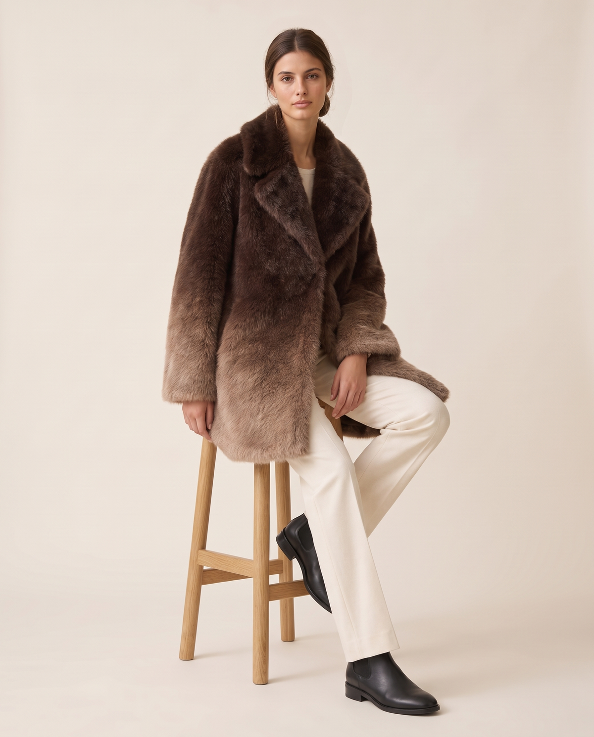 Oversized Gradient Faux Fur Coat — worn seated
