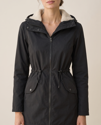 Fitted Waterproof Jacket with Sherpa Hood — sherpa hood and drawstring, worn