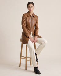 Longline Leather Biker Jacket for Women — worn seated