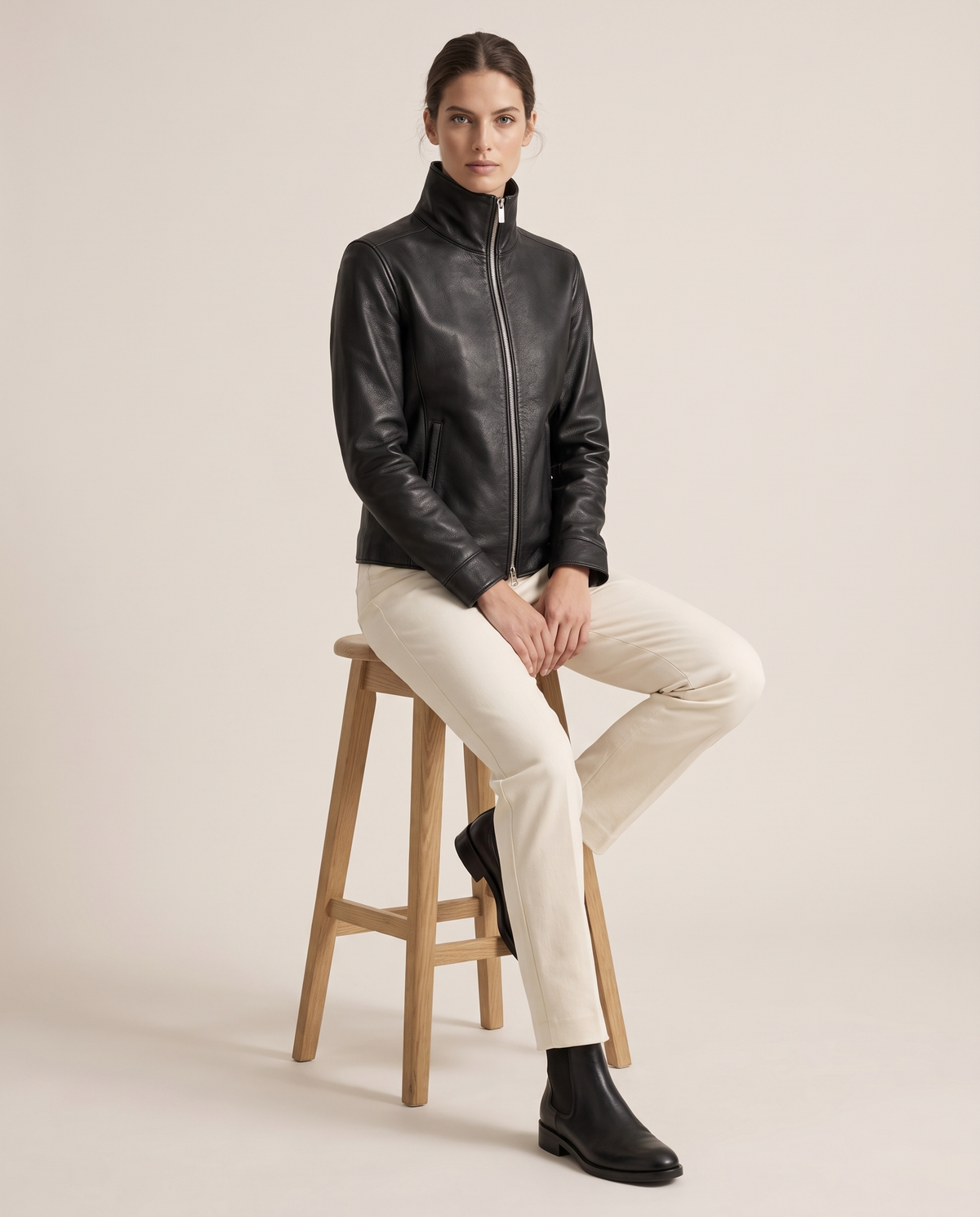 High-Neck Zip Leather Jacket for Women — worn seated
