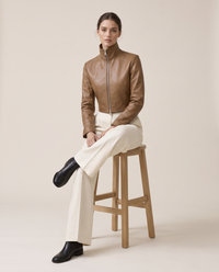 Cropped High-Neck Leather Jacket for Women — worn seated