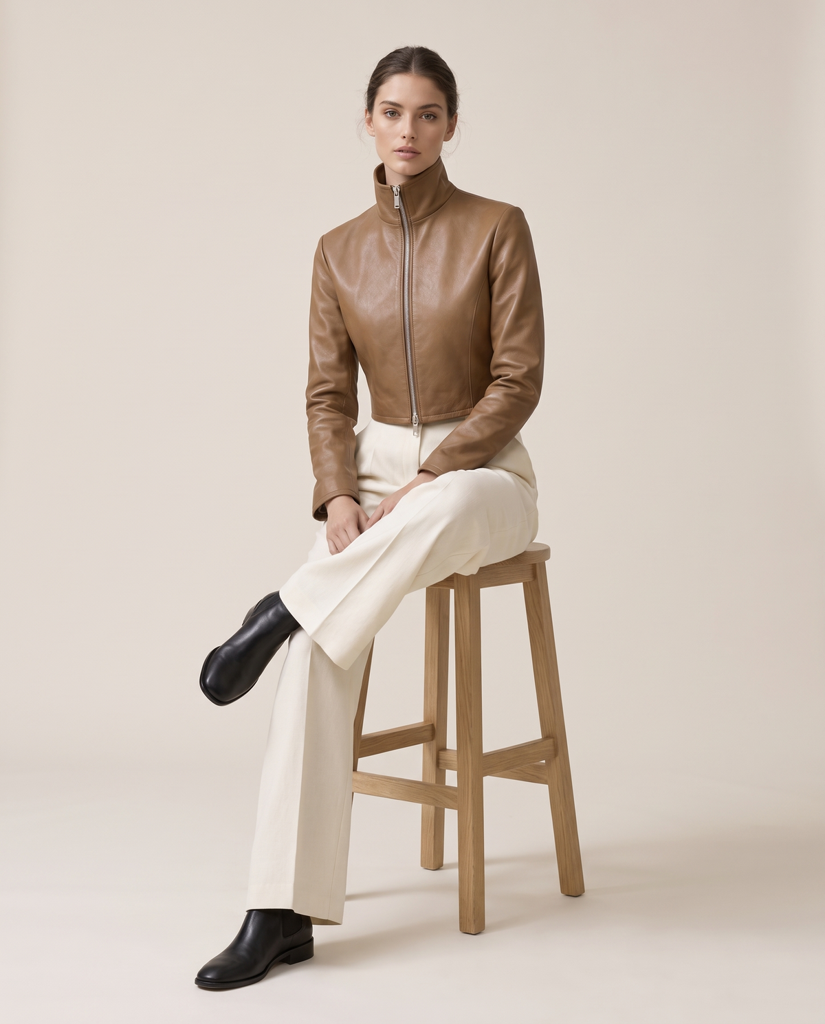 Cropped High-Neck Leather Jacket for Women — worn seated
