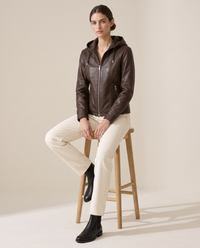 Hooded Leather Jacket for Women — worn seated