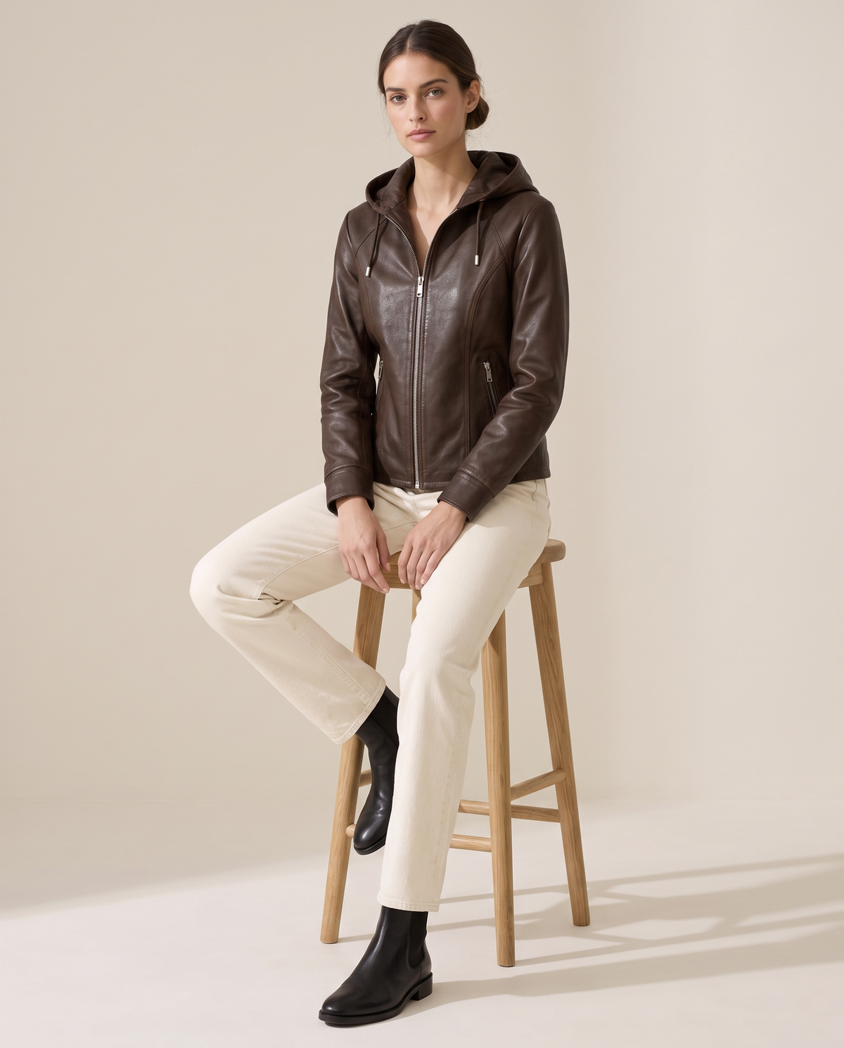 Hooded Leather Jacket for Women — worn seated