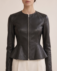 Cropped Fit-and-Flare Leather Jacket — peplum waist, worn