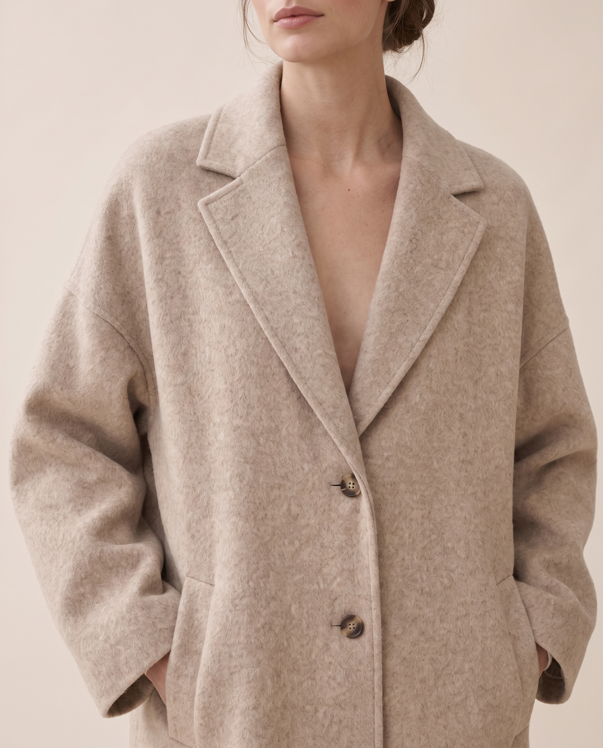 Oversized Wool-Blend Coat with Dropped Shoulders — lapels and shoulders, worn