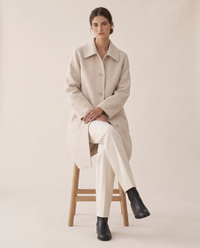 Polo Collar Coat with Pockets — worn seated