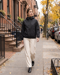 Waterproof Hooded Windbreaker Jacket for Women — worn on a New York street in autumn