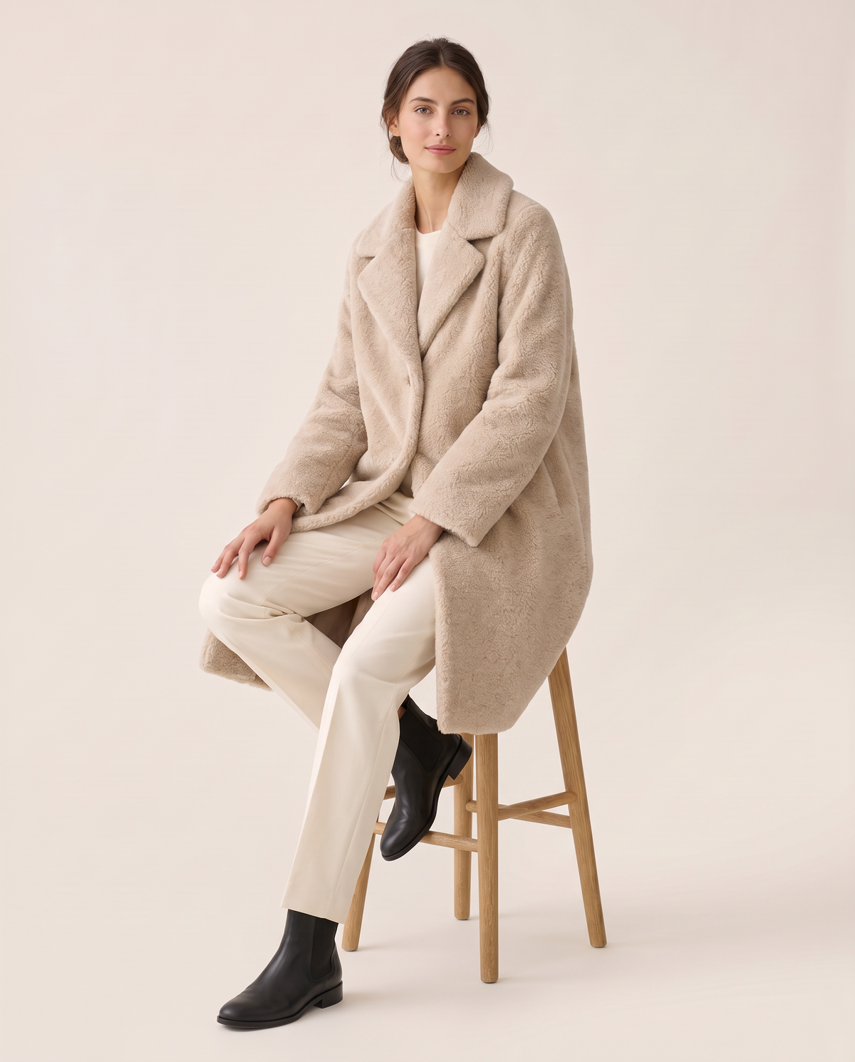 Plush Fleece Coat with Wide Lapels — worn seated