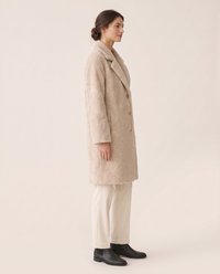 Plush Fleece Coat with Wide Lapels — three-quarter view