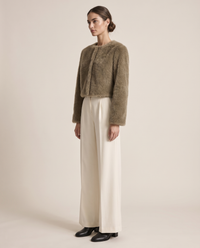 Cropped Faux Fur Jacket with Hidden Closure — three-quarter view