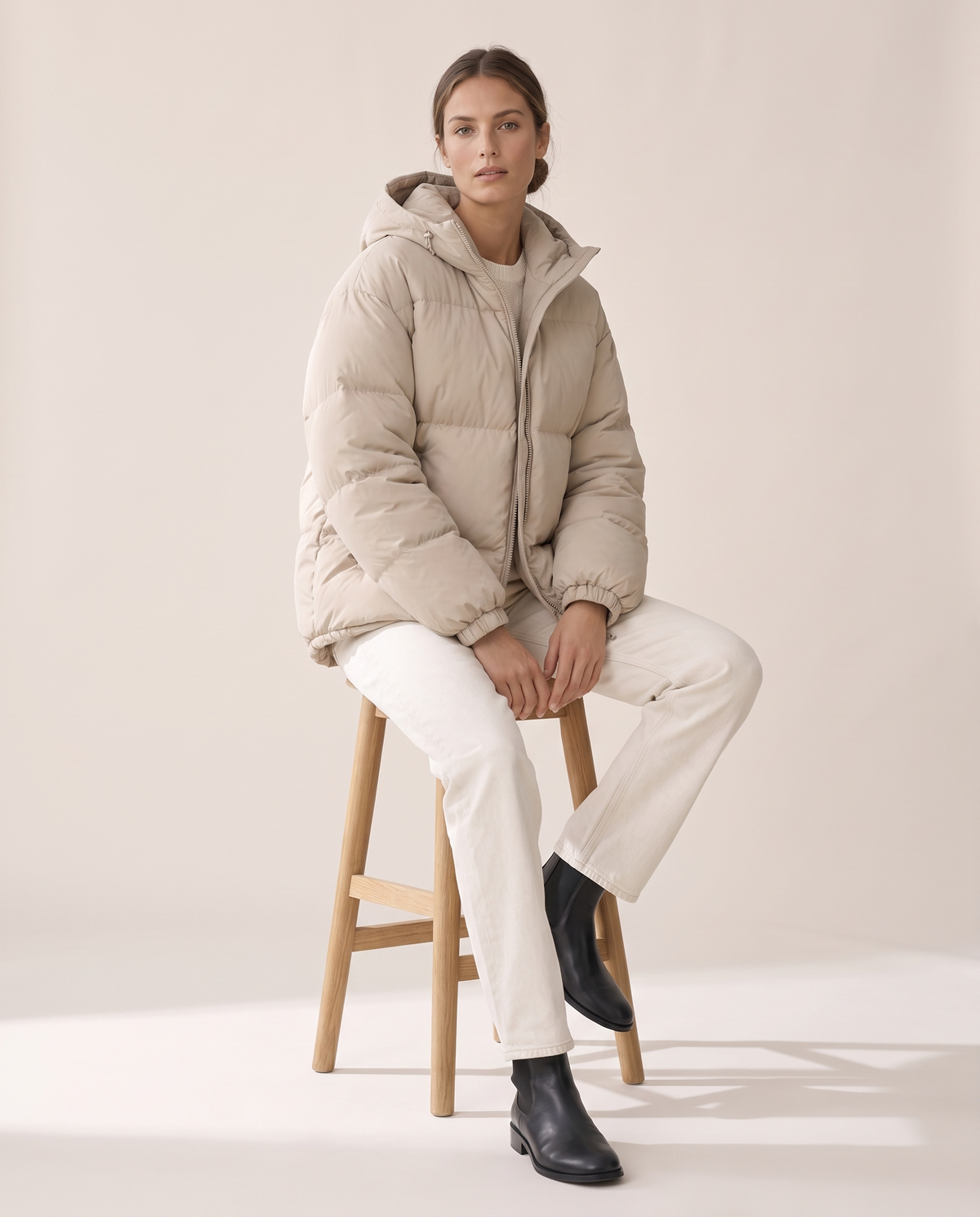 Loose Hooded Down Jacket for Women — worn seated