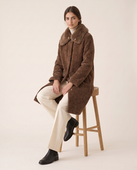 Chenille Coat with Detachable Fur Collar — worn seated