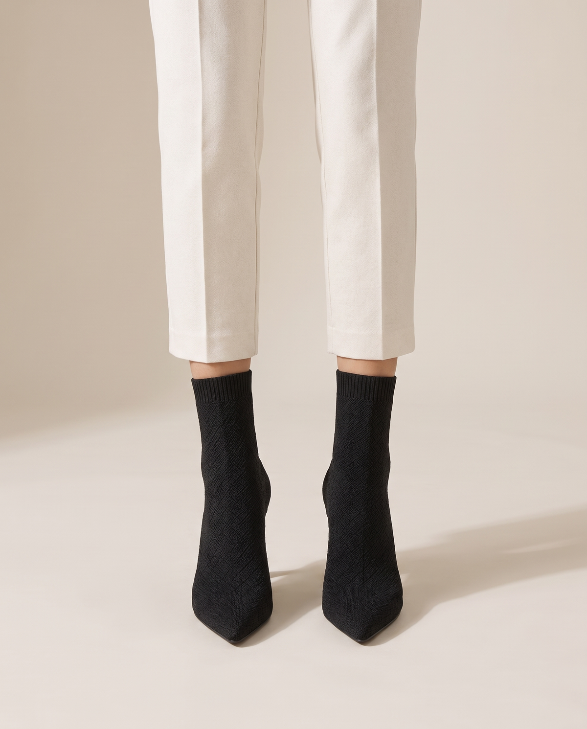 Pointed Toe Sock Boots in Stretch Knit — worn, studio