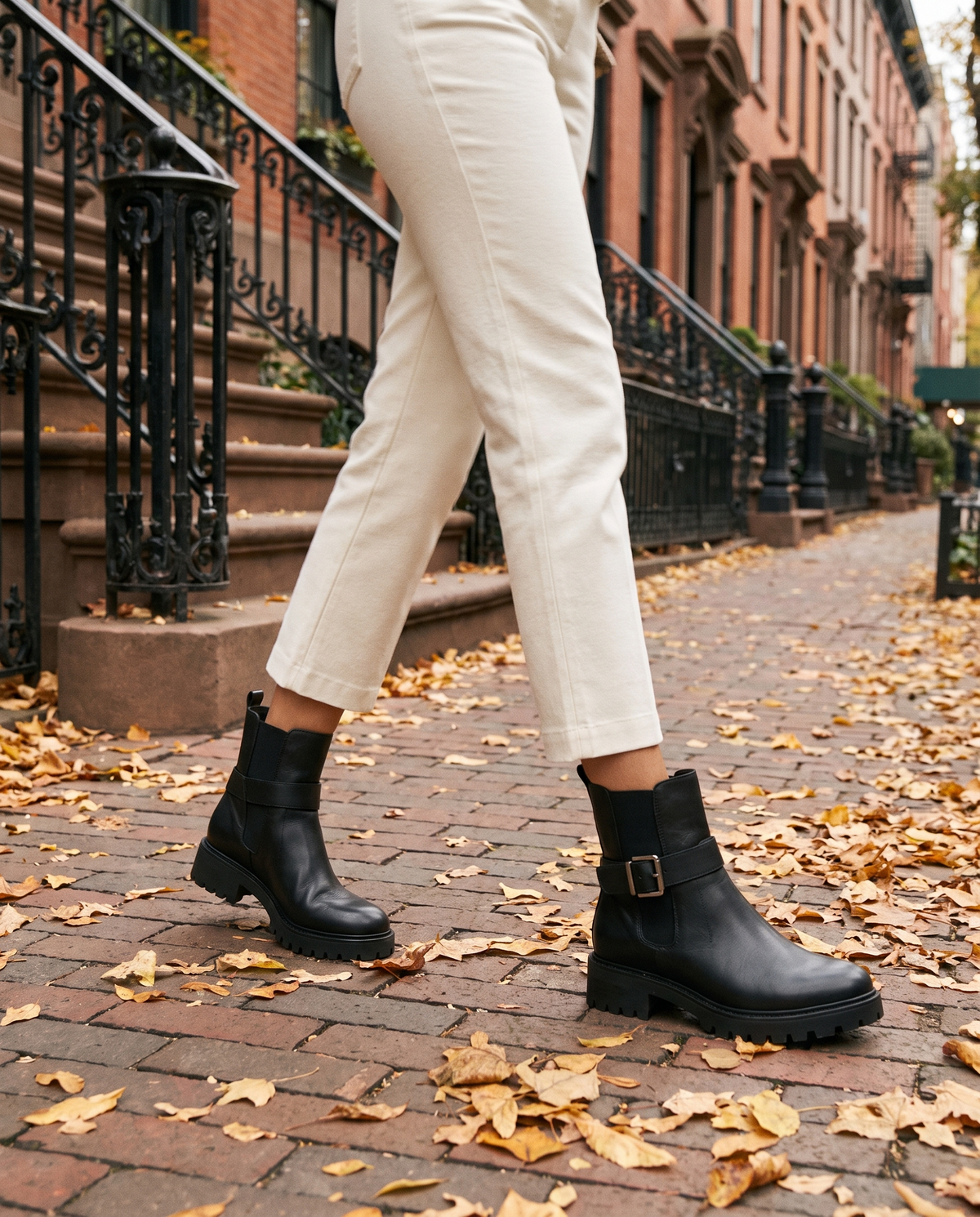 Pull-On Ankle Boots with Buckle Strap and Lug Sole — worn on a New York street in autumn