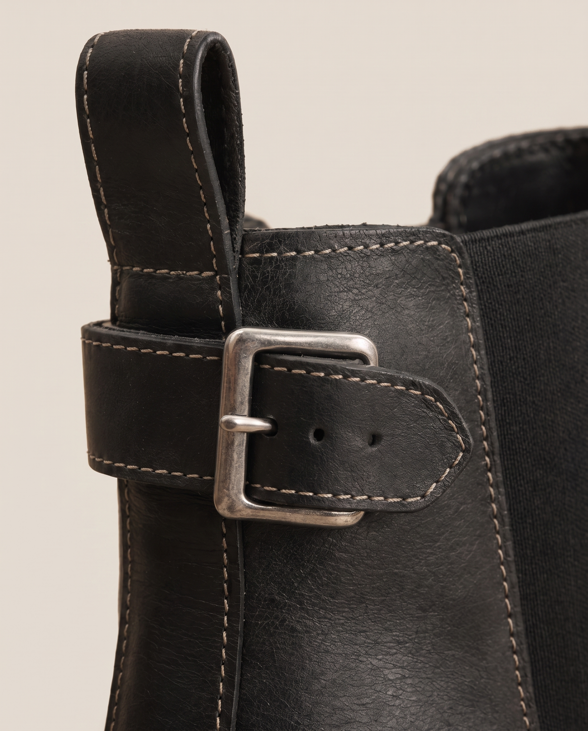 Chelsea Ankle Boots with Buckle Strap and Lug Sole — buckle close-up