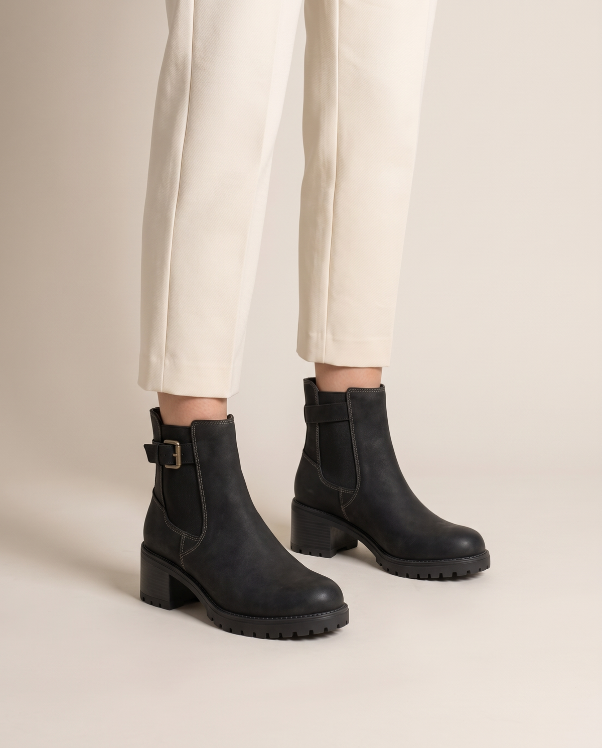 Chelsea Ankle Boots with Buckle Strap and Lug Sole — worn, studio