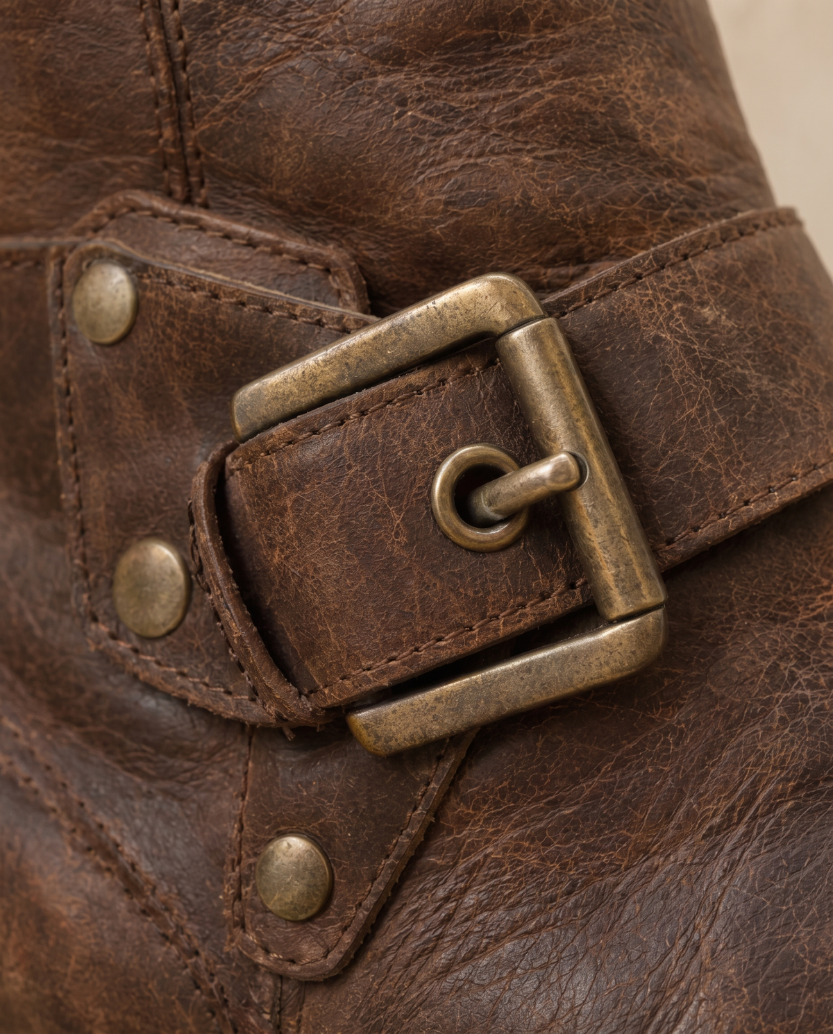 Distressed Ankle Boots with Buckle Straps — buckle close-up