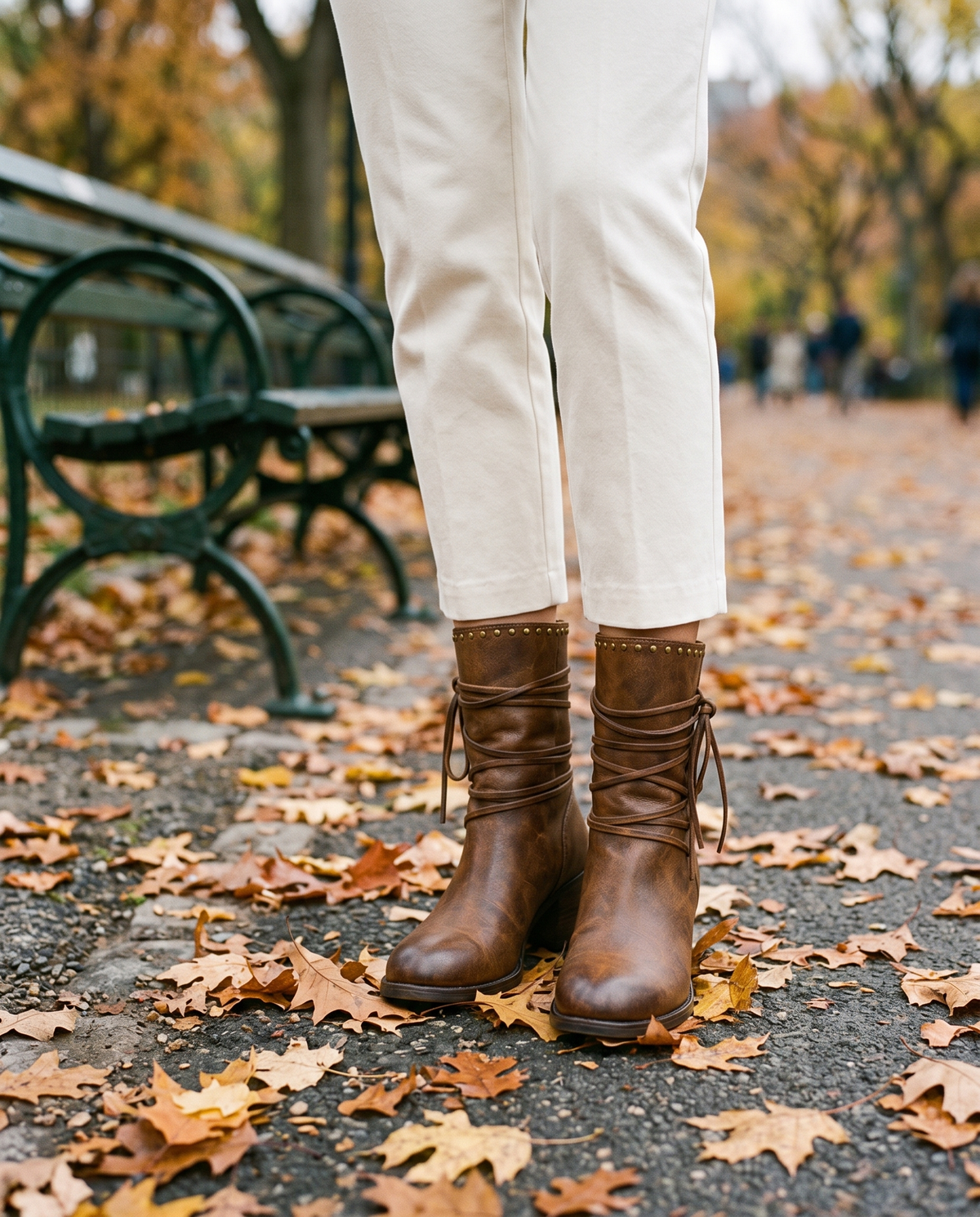 Lace-Up Western Ankle Boots with Studded Trim — worn in Central Park in autumn