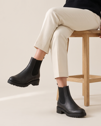 Chelsea Ankle Boots with Low Block Heel and Zip — worn seated