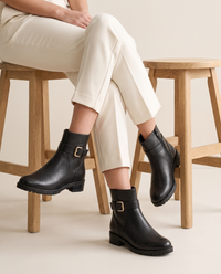 Leather Ankle Boots with Buckle and Side Zip — worn seated
