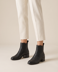 Ankle Boots with Side Pull Tabs and Low Block Heel — worn, studio