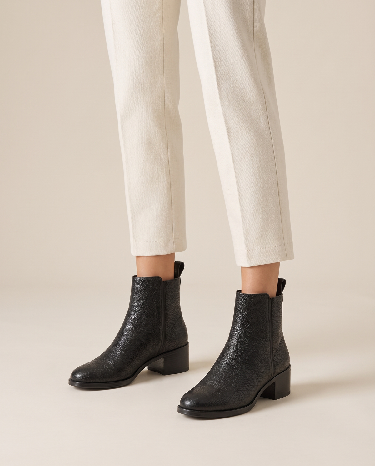 Ankle Boots with Side Pull Tabs and Low Block Heel — worn, studio