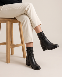 Ruched Ankle Boots with Side Zipper — worn seated