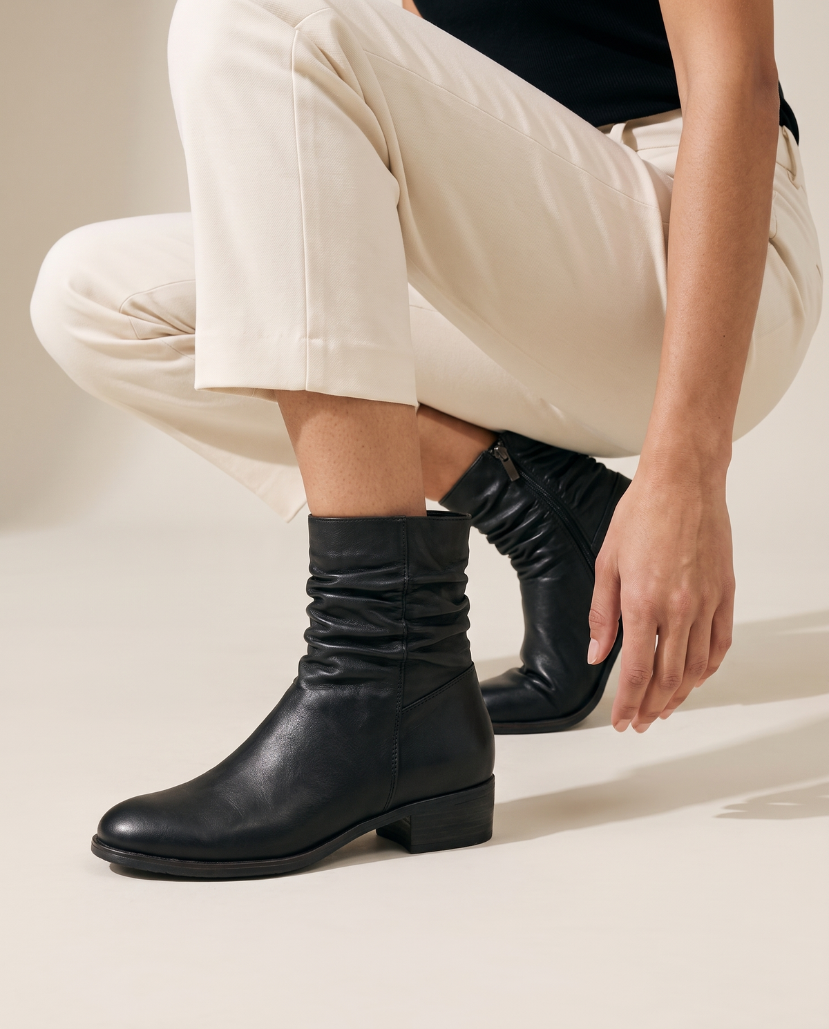 Ruched Ankle Boots with Side Zipper — worn, crouching