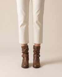 Slouch Ankle Boots with Buckle Strap — worn, studio