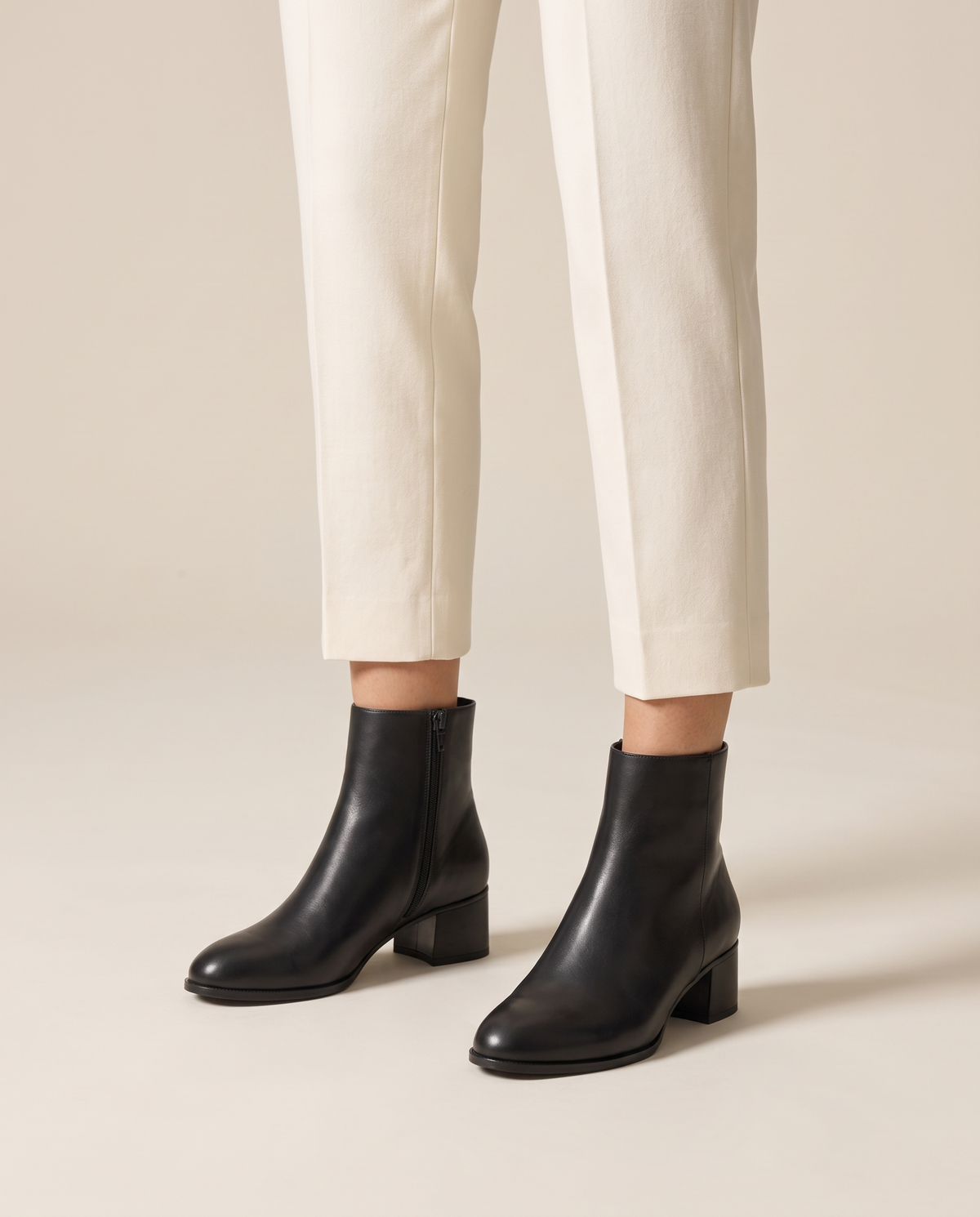 Sleek Ankle Boots with Low Block Heel — worn, studio