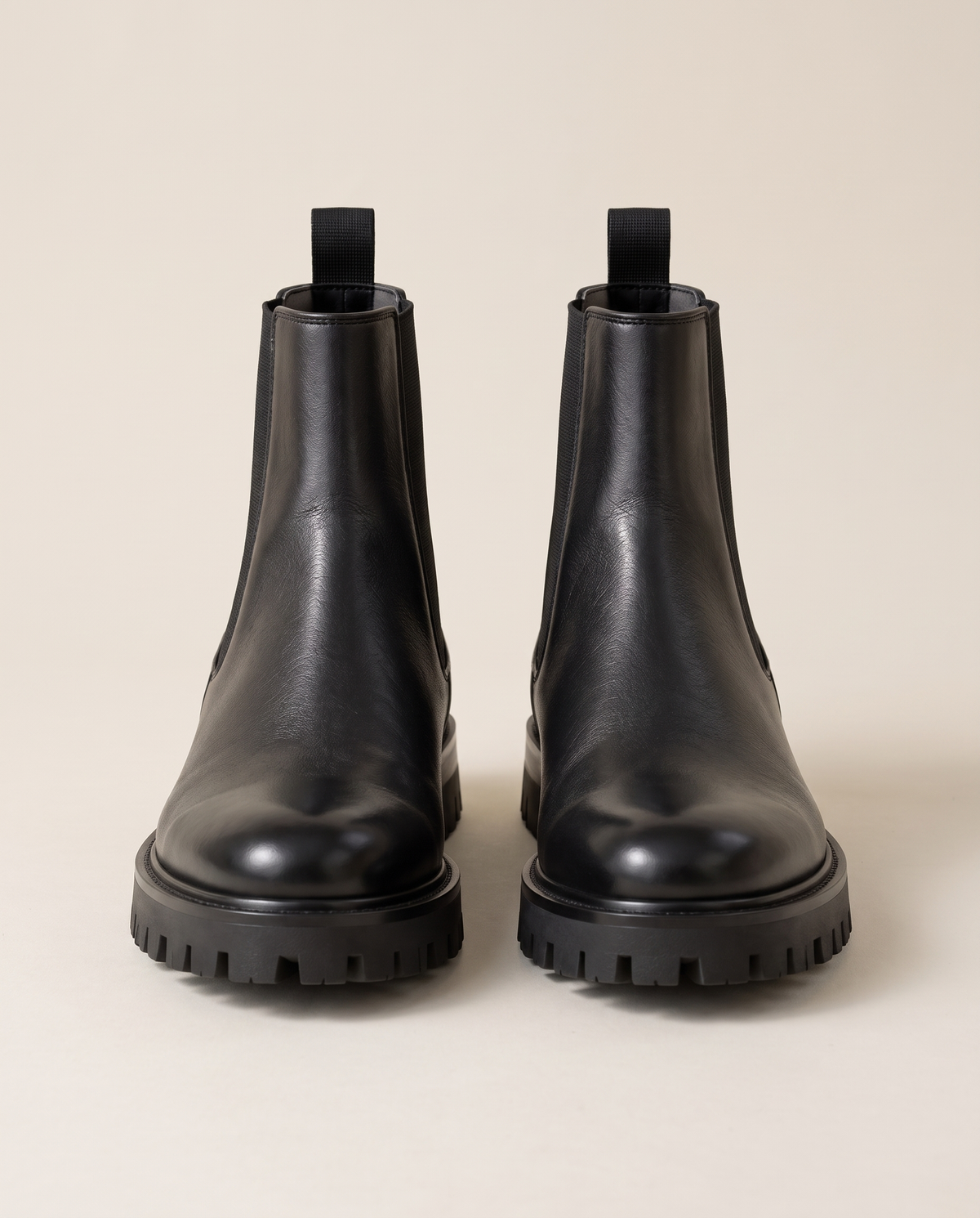 Lug Sole Chelsea Boots with Front and Back Pull Tabs — pair, studio