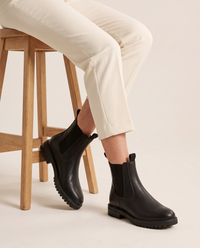 Chelsea Boots with Elastic Panels and Pull Tab — worn seated