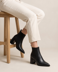 Pointed Toe Chelsea Boots with Block Heel — worn seated