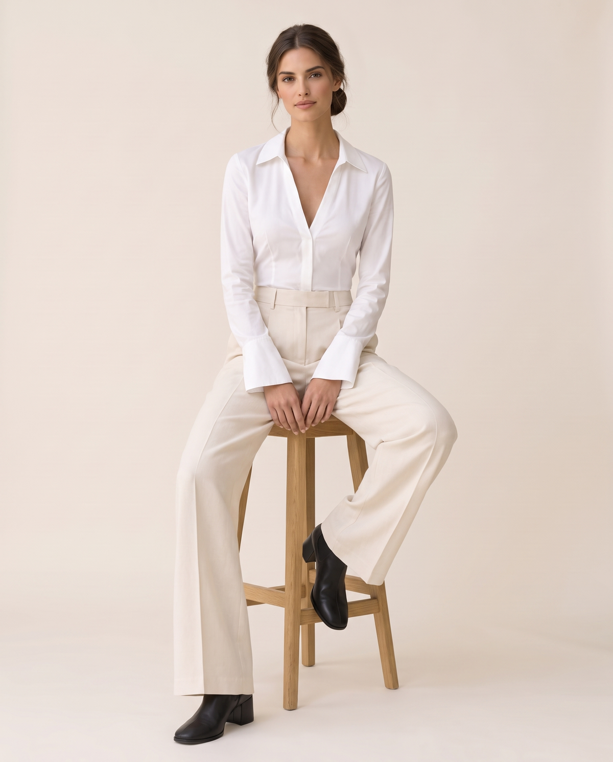 Spruce Sleek Fitted V-Neck Blouse — seated