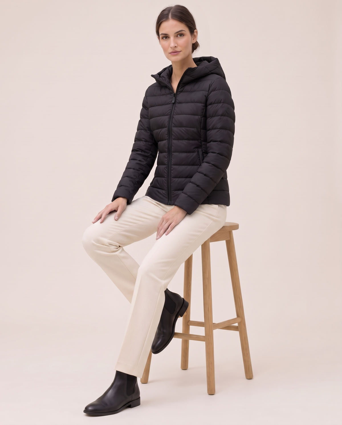 Quilted Hooded Puffer Jacket for Women — worn seated