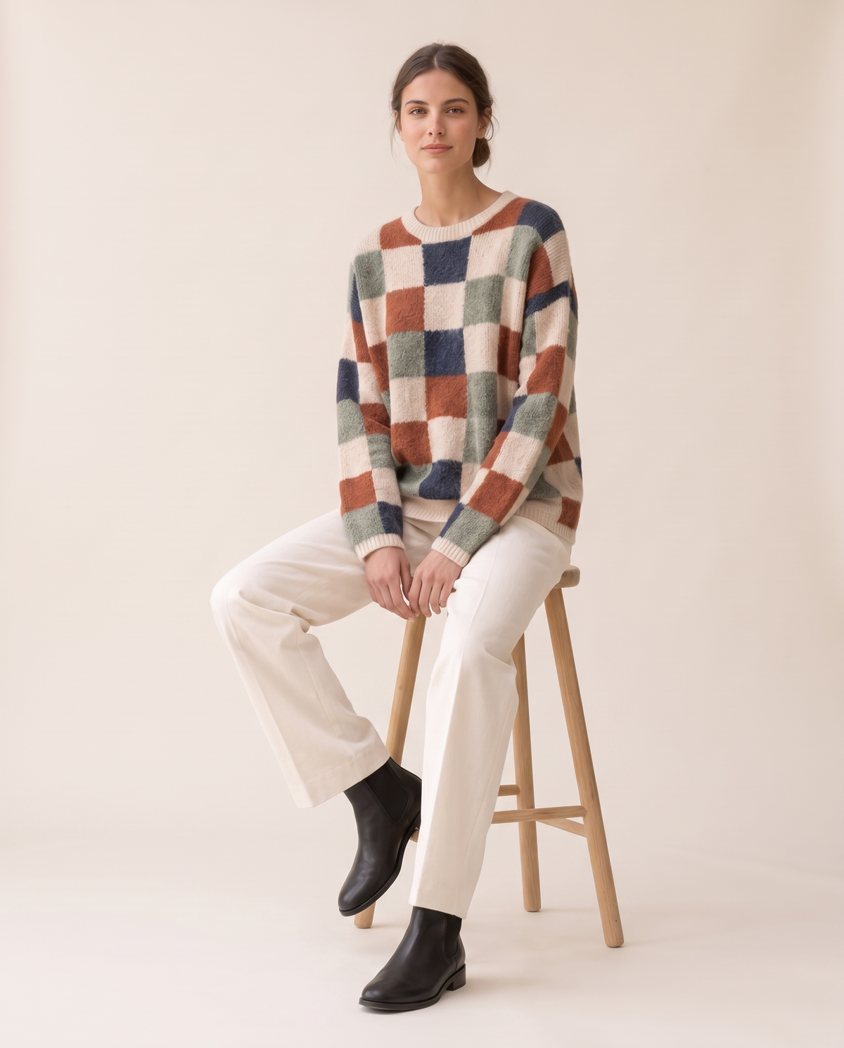 Silverton Cozy Checkered Print Pullover Sweater — worn seated