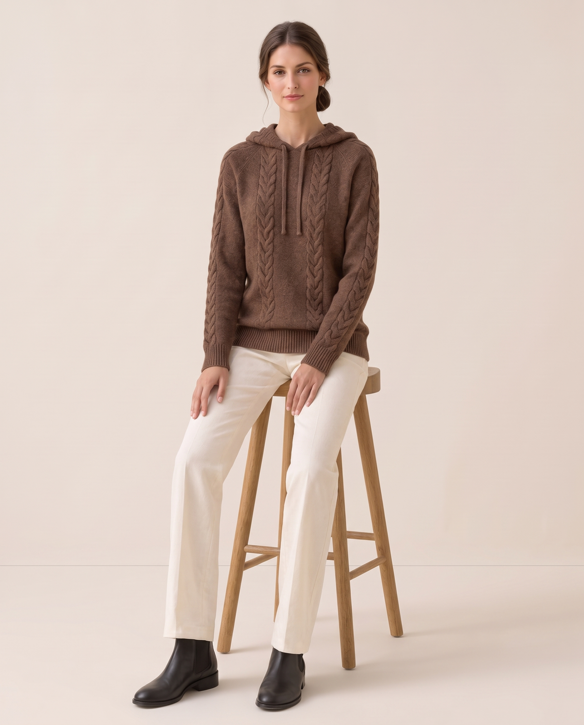 Marzamemi Cozy Hooded Cable Knit Pullover Sweater — worn seated