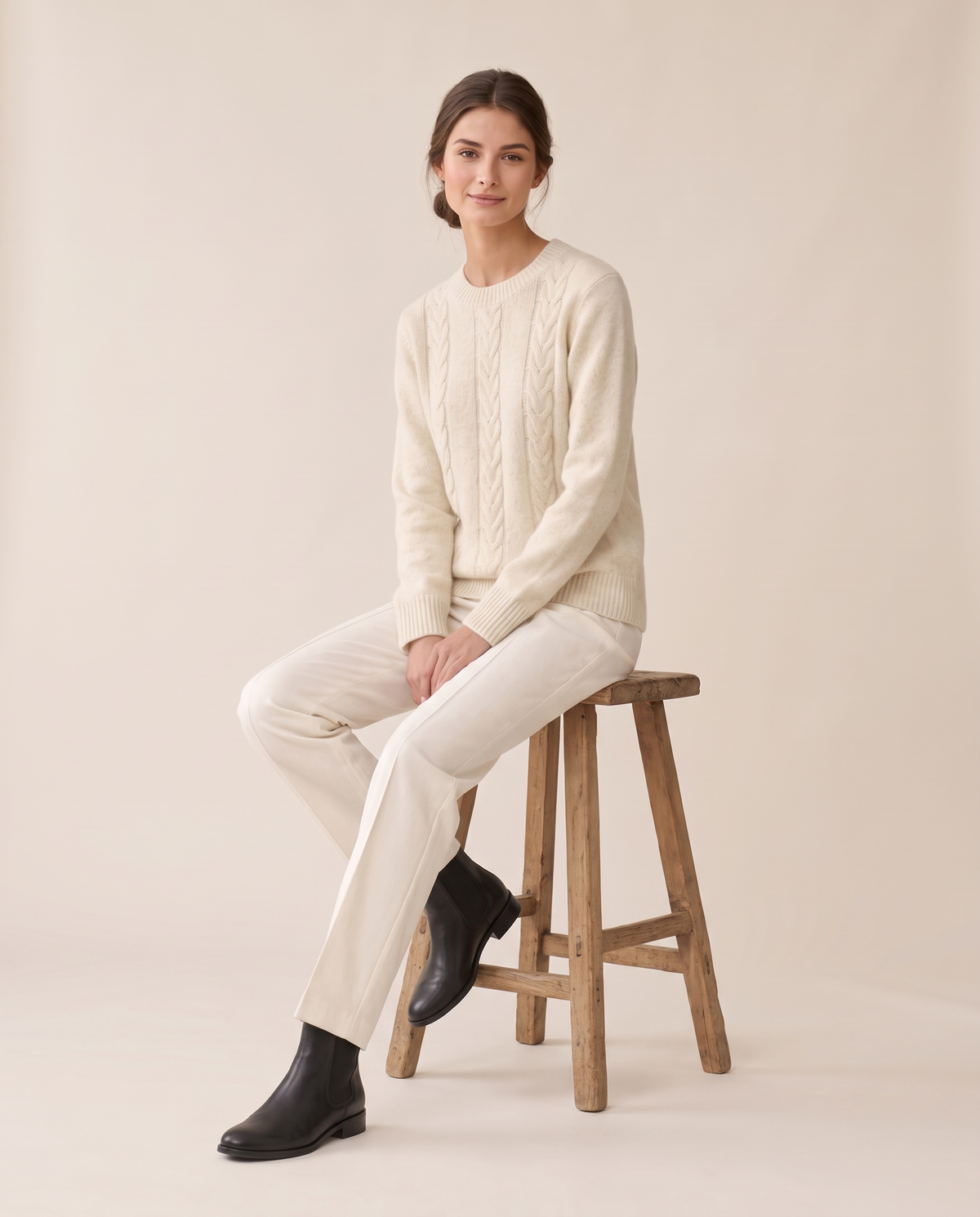 Favignana Classic Cable Knit Crew Neck Sweater — worn seated