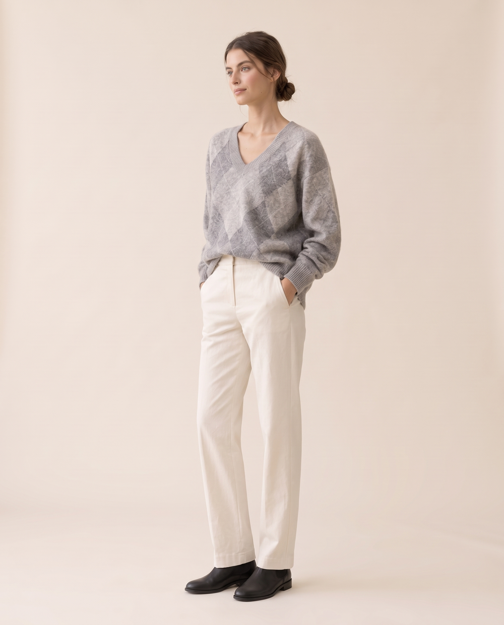Vail Relaxed Oversized Argyle V-Neck Sweater — three-quarter view