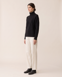 Thornbury Warm Ribbed-Cuff Geometric Knit Turtleneck Sweater — three-quarter view