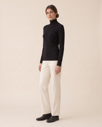 Merano Classic Solid Knit Turtleneck Sweater — three-quarter view