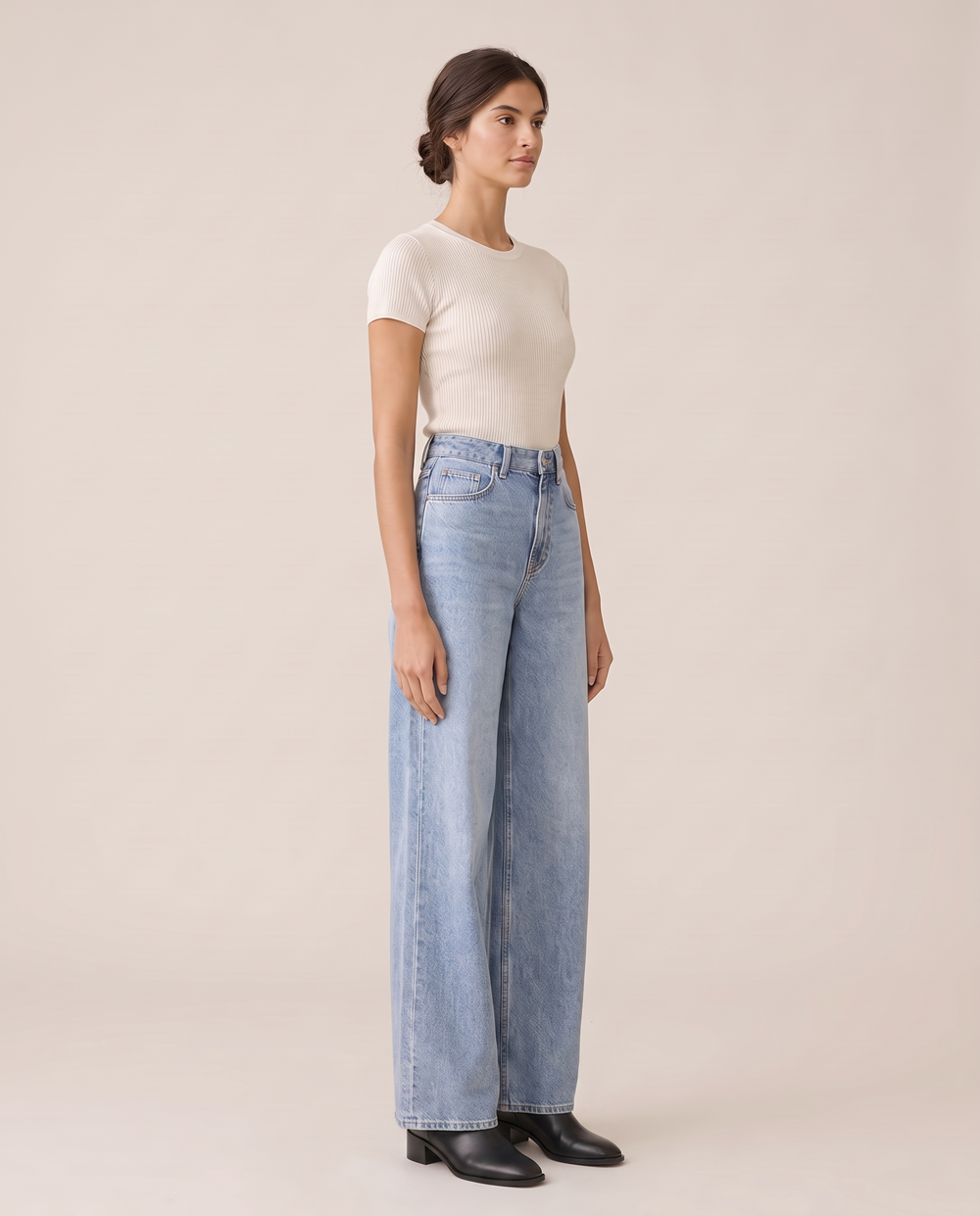 Faustine Baggy Flare High Waisted Jeans — three-quarter view
