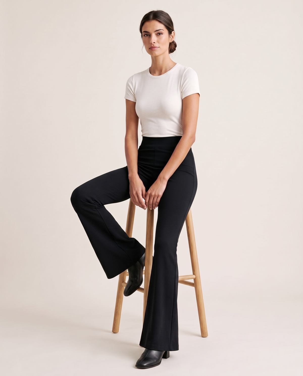 Chiswick High-Waisted Stretch Flare Pants — seated