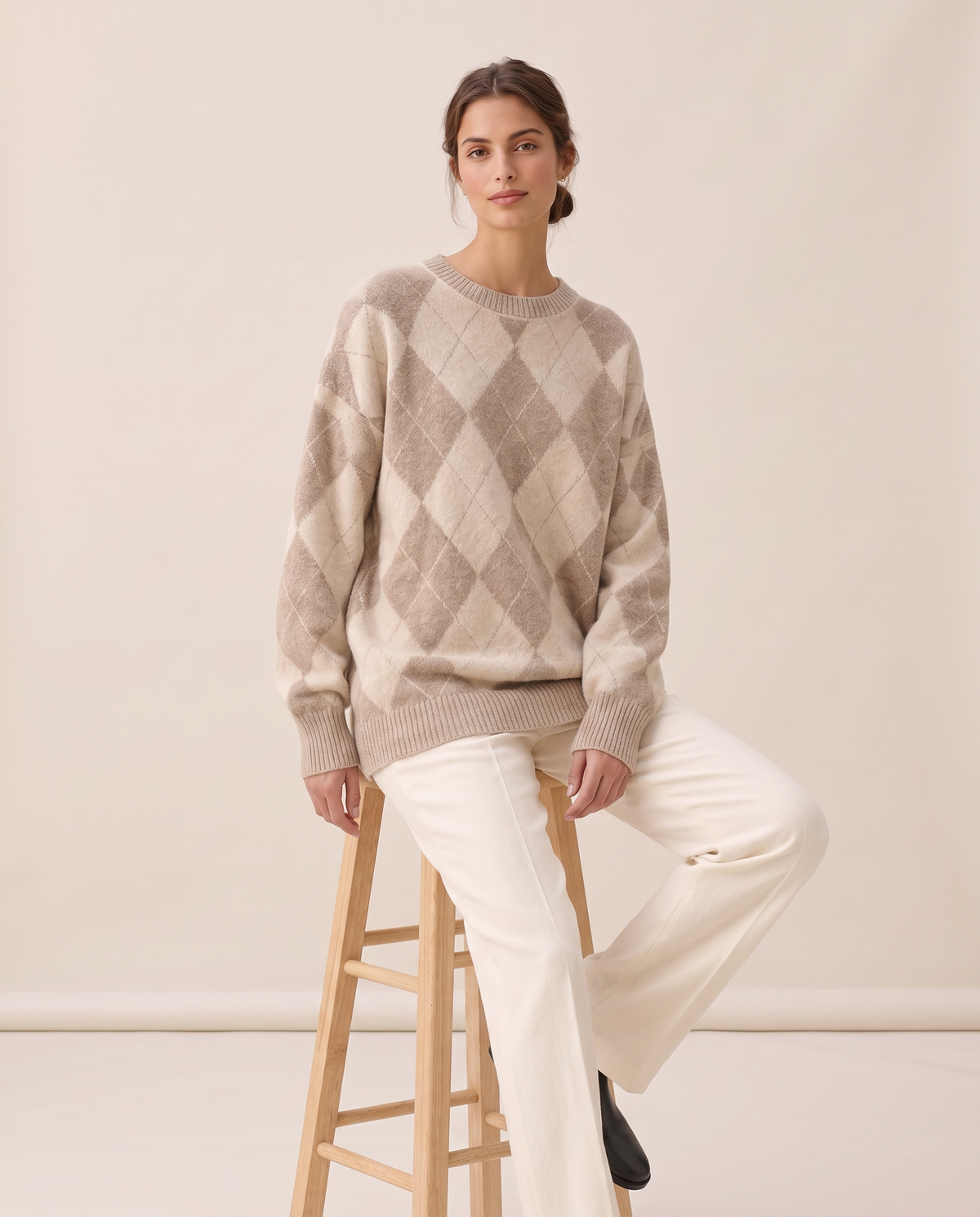 Lantern Oversized Argyle Drop-Shoulder Crew Neck Sweater — worn seated