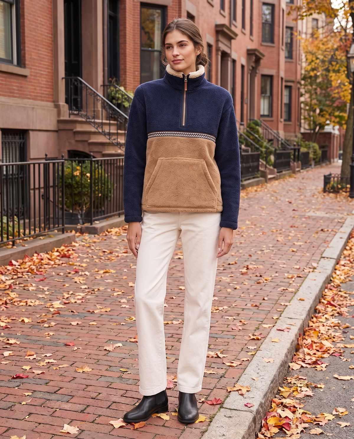 Zion Cozy Color-Block Quarter-Zip Sherpa Pullover — zipped to the collar on a Boston street