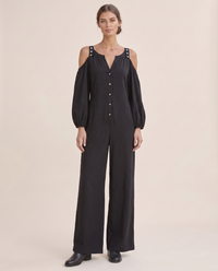 Ashland Relaxed Cold-Shoulder Wide-Leg Jumpsuit — black, studio front