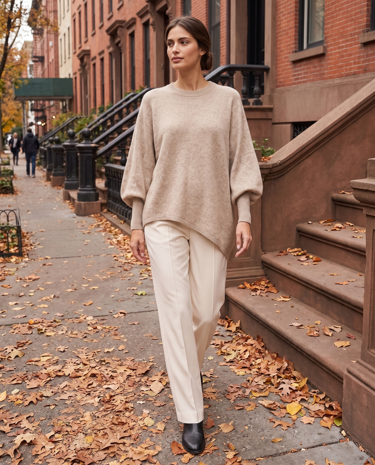 Ghent Warm Wool-Blend Draped Sweater with Asymmetric Hem — worn on a New York street in autumn